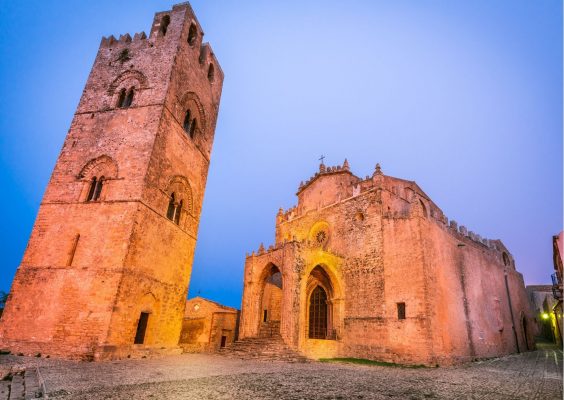 Norman cathedral and bell tower of Erice at dusk